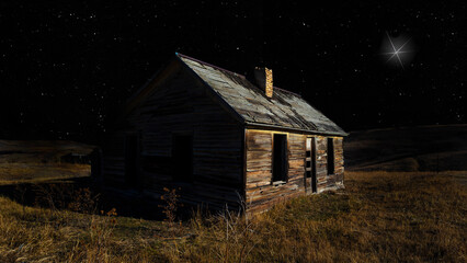 Christmas star rising over an old wooden home that has long been abandoned and rotting away in a...