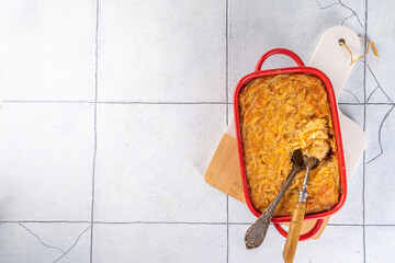 Homemade baked potato casserole with cream, cheese and potato, grated c, french american cuisine,...