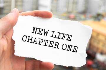 Text sign showing New Life Chapter One