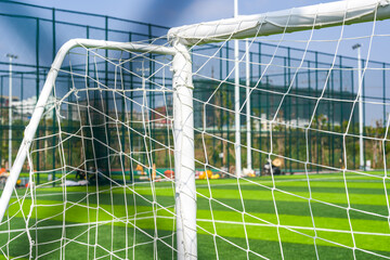Close-up of the goal and touchline of a brand new football stadium