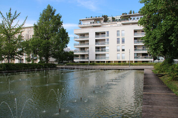 Fototapeta premium modern flat buildings and pond in nancy (france)