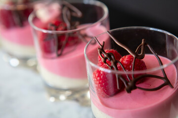 raspberry pannacotta with one layer of vanilla chocolate. Happy new year desert 