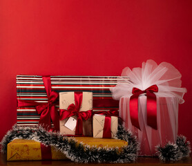 wrapped christmas gifts on Red background