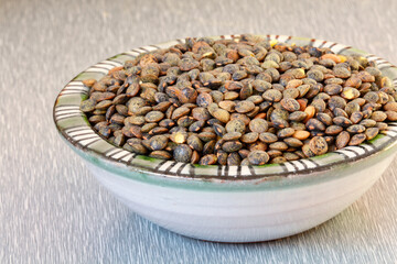 Detail of some lentils in a ceramic bowl, Spain