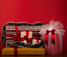 wrapped christmas gifts on Red background