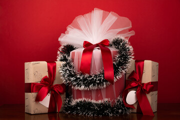wrapped christmas gifts on Red background
