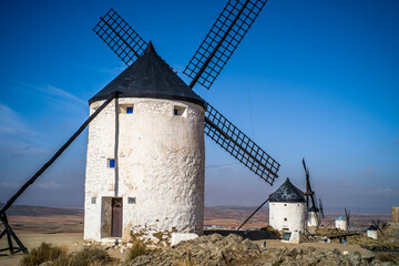 Fototapeta na wymiar Old historic windmills on the hills of Consuegra. Molinos de Viento de Consuegra