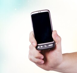 Hand hold modern smart phone with a blank screen