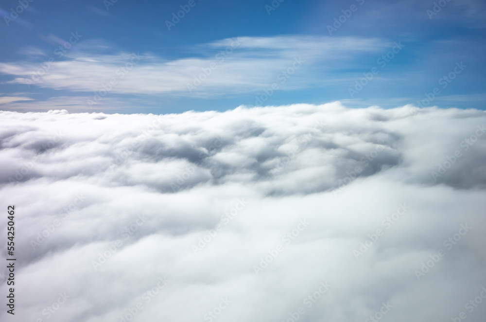 Wall mural view of the sky and fluffy clouds in the nature