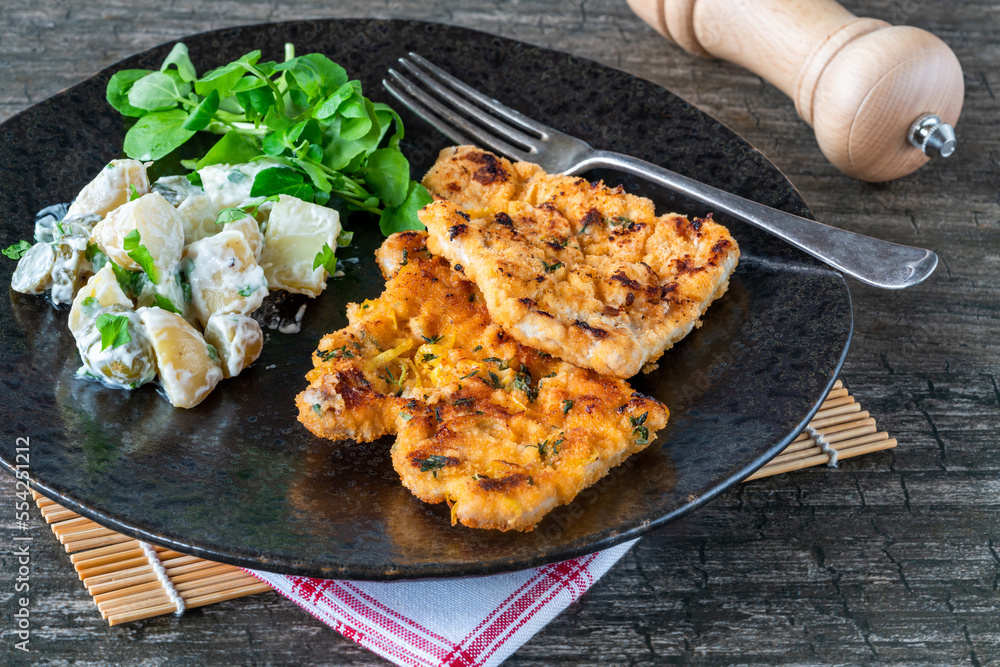 Canvas Prints lemon and thyme pork schnitzel with potato salad