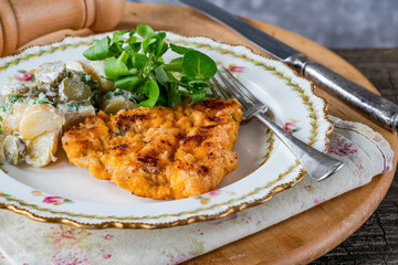 Lemon and thyme pork schnitzel with potato salad