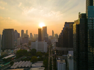 Aerial view office city building with Mahanakorn building sunset