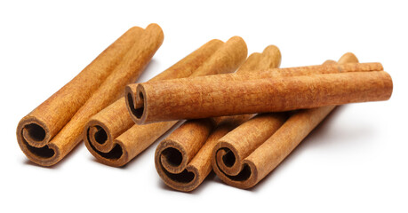 Delicious cinnamon sticks, isolated on white background