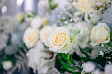 Close-up of a newlywed table at a wedding dinner decorated with flowers. wedding concept.