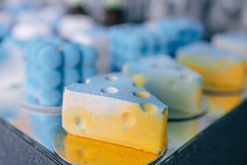 beautiful and delicious dessert covered with blue filling on the festive table