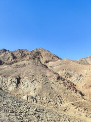 Fototapeta na wymiar Sinai mountains against clear sky