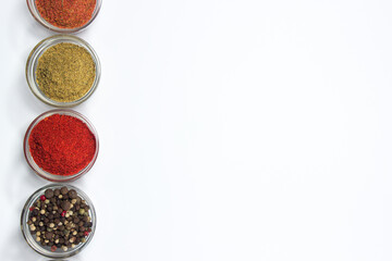 Various spices on a white background. There is room for copy space