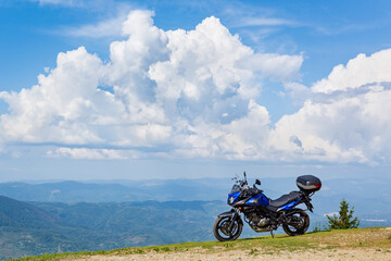 Motorcycle on top of the mountain landscape