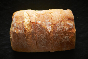 bread on a black background