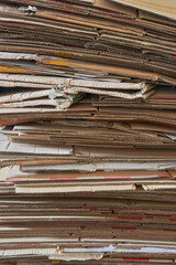abstract of stack of cardboard, pile of waste corrugated cardboard used in packaging for recycling, full frame background