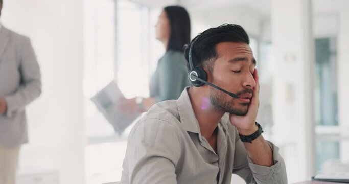 Telemarketing, tired and call center agent working on pc, online phone call and overworked crm contact us consultant. Asian man, stress headache and customer service consultation fatigue or burnout