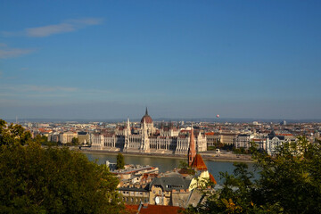 Fototapeta na wymiar Hungarian Parliament and the river Danube on a sunny day