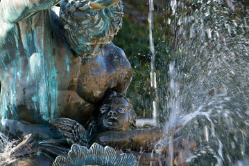 Fototapeta na wymiar The Fountain of Triton in tge Buda Castle Garden Bazaar