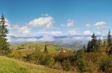 Naklejka na ściany i meble Beautiful autumn morning near Carpathian village outskirts (Carpathian mountain, Ukraine).
