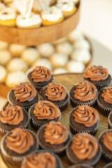 Chocolate and Vanilla cupcakes at a wedding reception