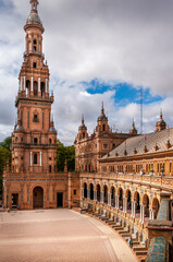Obraz premium Plaza de Espana, Spain Square with the Northern Tower view, the canal and rowing boats in Seville City Center, Spain.