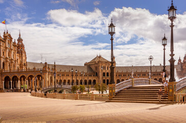 Fototapeta premium Nobody walking near fountain at the Spain Square Plaza de Espana in Seville city, Andalusia, Spain. Example of Moorish and Renaissance revival