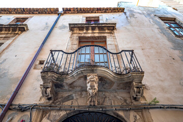 Siracusa, Sicily. One of the spectacular balconies in the city is an example of the Sicilian baroque style.