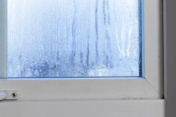 Condensation on the window inside the house.