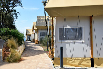 Luxury camping tent resort in Istria, Croatia, Adriatic sea coast. Mobile homes in campground of...