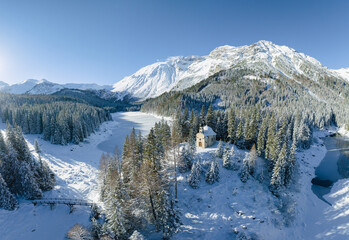 Chapel at Lake Obernberg in the Austrian Alps in Winter.