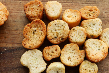 Croutons on wooden background