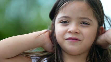 Adorable small girl portrait face smiling female child