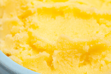 Ghee in a butter dish isolate on a white background