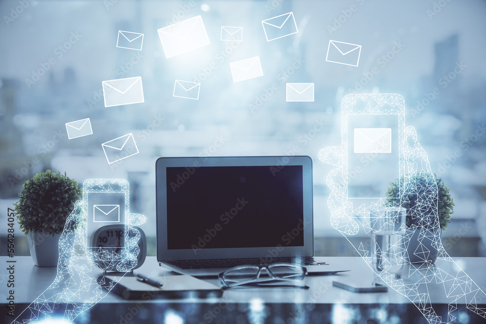 Poster desktop computer background in office and flying envelops hologram drawing. double exposure. electro