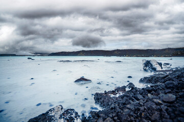 Volcanic lake surrounded by lava rocks