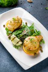 salad with pear and blue cheese on plate vertical