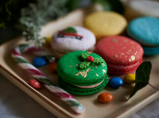 Close up of Christmas macarons and candy