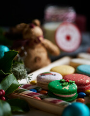 Close up of Christmas macarons,, candy and decorations