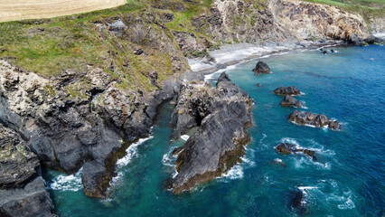 Steep cliffs on the coast. Turquoise waters of the Atlantic Ocean. Natural beauties of Ireland,...
