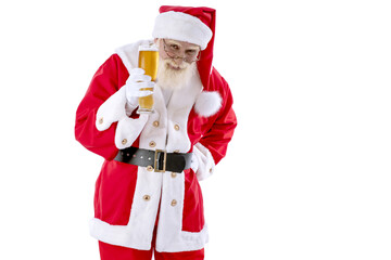 Santa Claus with a glass of beer on white background isolated
