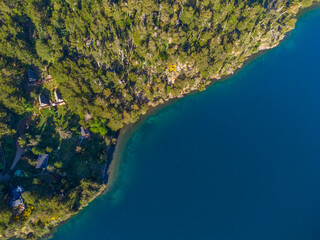 Colonia Suiza. Bariloche. Coast as a background from top view. Turquoise water background from top view. Summer landscape from air. Travel