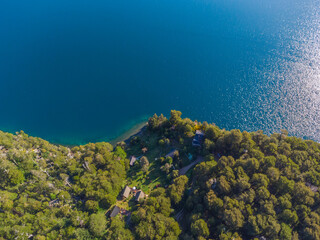 Colonia Suiza. Bariloche. Coast as a background from top view. Turquoise water background from top view. Summer landscape from air. Travel