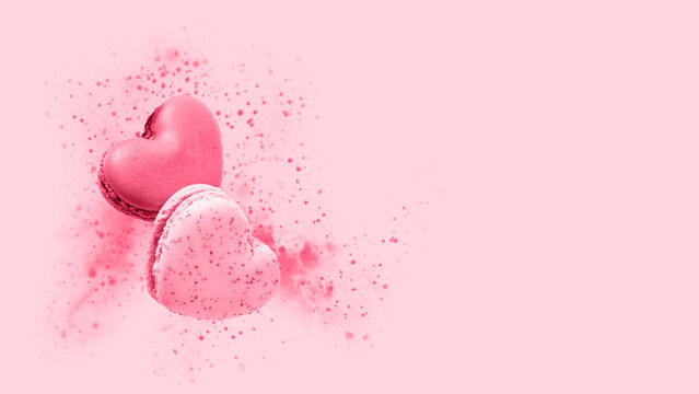  Monochrome image with french macaron cookies toned in trendy color 2023 Viva Magenta.