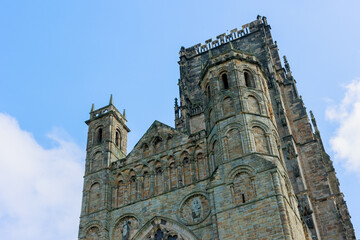 Fototapeta na wymiar Durham England: 2022-06-07: Durham Cathedral exterior during sunny summer day. Closeup view
