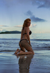 Young beautiful female model pose in micro bikini at st james morgan bay st lucia